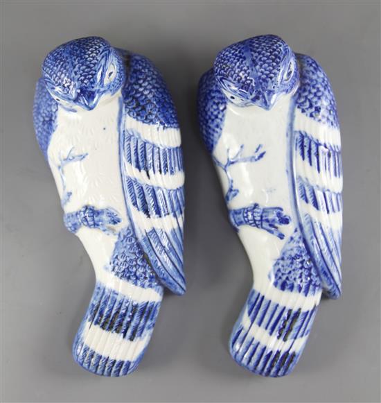 Two Japanese Arita blue and white hawk wall pockets, late 19th century, 20cm